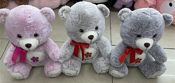 МС.Медведь 35см с бантиком и цветочком (глаза блестят)  D40706