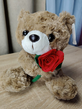 ММ.Медведь 21см с розочкой, кудряв.мех 1цв. D38074